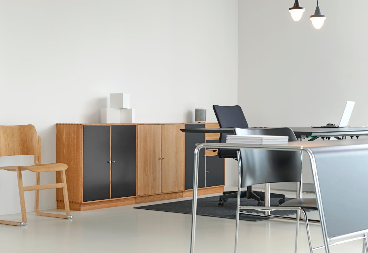 home-hero A clean and organized modern office space with stylish furniture and decor.